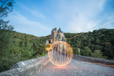 in the eve at the Eltz Castle with a beautiful evening light and starsのeditorial素材