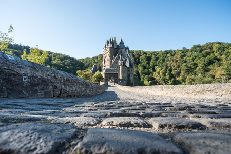 in the eve at the Eltz Castle with a beautiful blue skyのeditorial素材