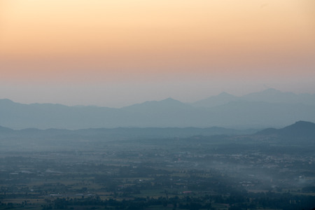 in the beautiful landscape of Thailand with sunrise over the mountains of Myanmarrの写真素材