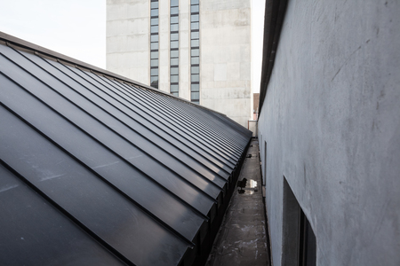 this large building with a flat roof with glass domeの写真素材