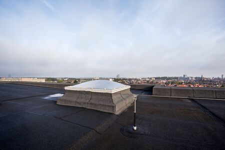 Plastic dome on a flat roof on a large building in the heart of the cityの写真素材