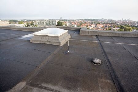 Plastic dome on a flat roof on a large building in the heart of the cityの写真素材