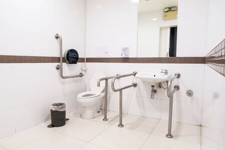 public disabled toilet in a large building