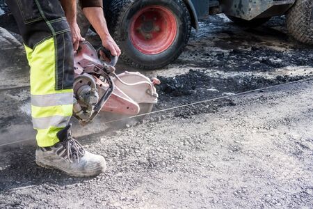 in the asphalt one grinds with a diamond grinding machine on gasoline