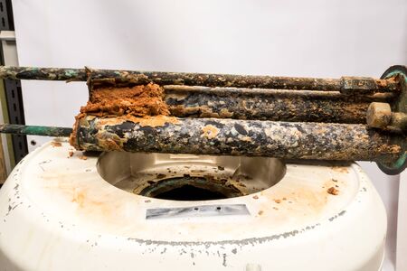 Due to the abundance of lime in the water pipes of the municipality, this resistance of the boiler is completely below the scaleの写真素材