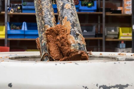 Due to the abundance of lime in the water pipes of the municipality, this resistance of the boiler is completely below the scaleの写真素材