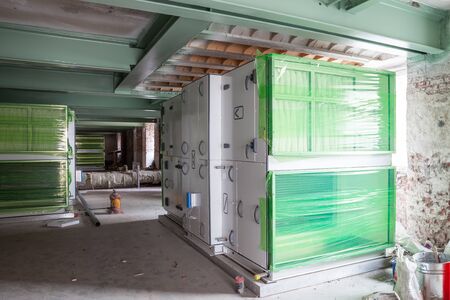 This area is being renovated in a large building whit an air unit