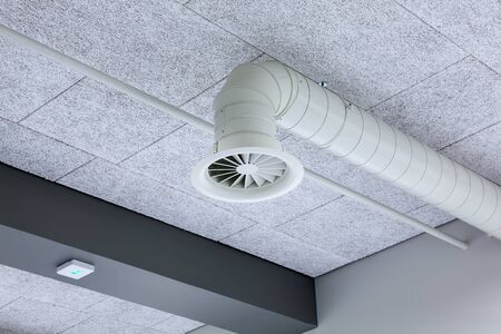 This modern ventilation in the corridor of a large building in the city