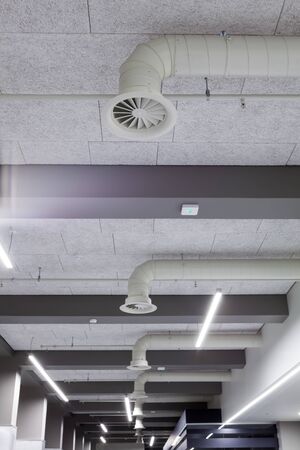 This modern ventilation in the corridor of a large building in the city