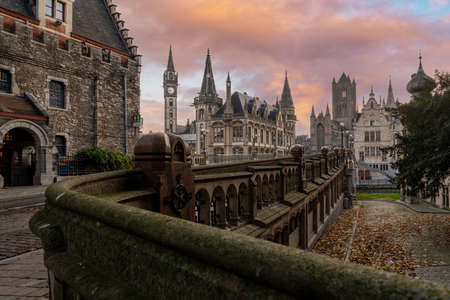 At the Graslei with the towers of Ghent with beautiful refection