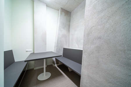 In a large building a seating area has been made for some privacyの写真素材
