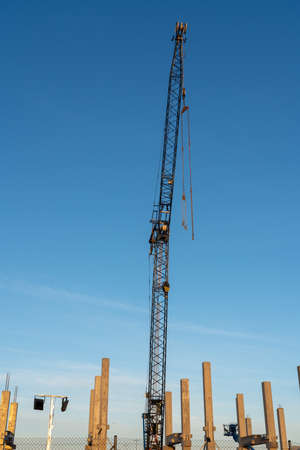 on a beautiful morning on a construction site this beautiful crane is standing