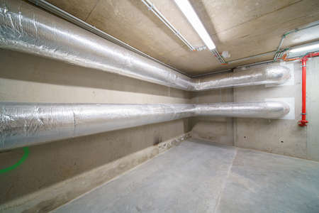 In an old building in the city, there are pipes in the basementのeditorial素材
