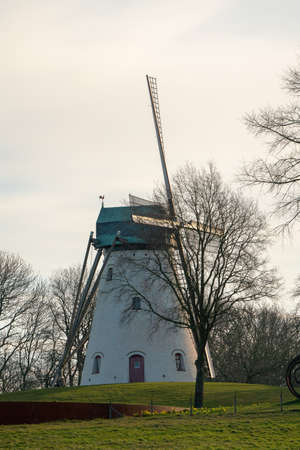 This beautiful Mountain mill is located in Anzegem Belgium, with the rise of the sun and heavily...