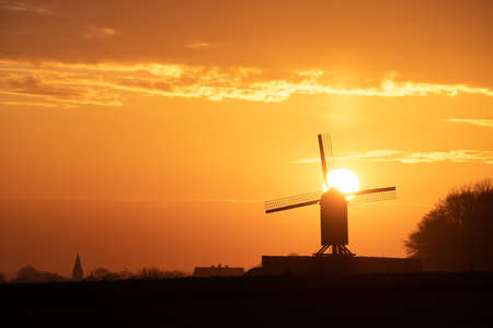 This beautiful Mountain mill is located in Wannegem-Lede Belgium, with the rise of the sun and...