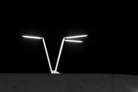 This beautiful LED illuminated street lamp is located on a parking buildingの写真素材