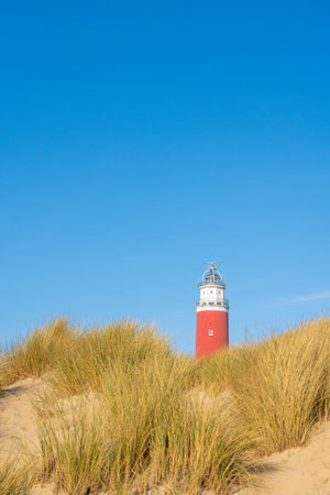 On a sunny day at the lighthouse of Texel Netherlandsの写真素材