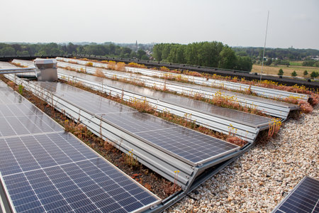 on a building in a residential area, there are eco solar panels on the roof