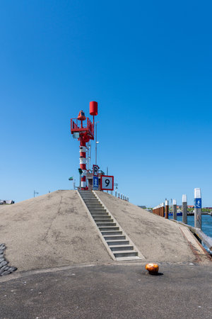 An a beautiful day at the pier is this beautiful look out towerの写真素材