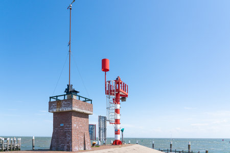 An a beautiful day at the pier is this beautiful look out towerの写真素材