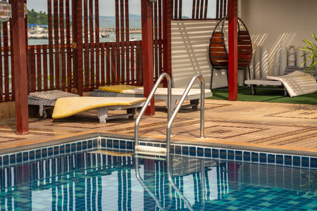 At the pool there is this staircase to get out of the poolの写真素材