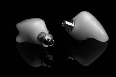 Dental crowns in detail with their components, macro photography in black and white style