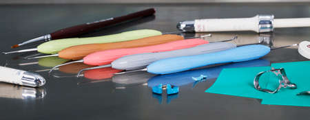 set of tools for ironing machines and others on a metal table