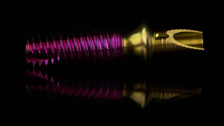 very beautiful dental implant with abutment on black glass with creative reflection