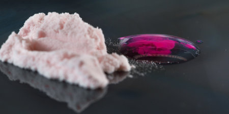 creative dental photo of drops of water and ceramic materials on glassの写真素材