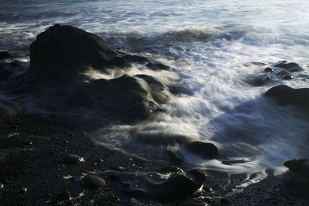 waves on the rocksの写真素材