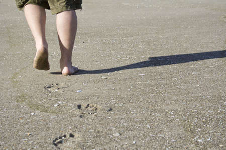 Human footprints in the sandの写真素材