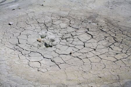 Parched, cracked earth that has been dried out by superheated water and volcanic gases in Lassen...