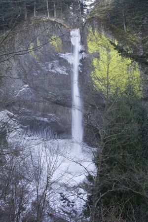 Latourell Falls in winter with ice and snowの写真素材