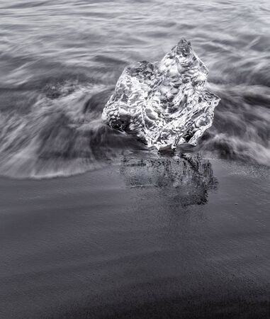 Glacial Ice on the beach at Jokulsarlon, Icelandの写真素材