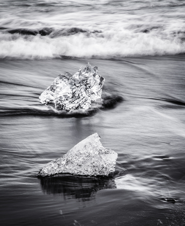 Glacial Ice on the beach at Jokulsarlon, Icelandの写真素材