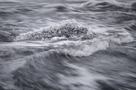 Glacial Ice on the beach at Jokulsarlon, Icelandの写真素材