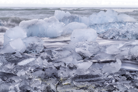 Glacial Ice on the beach at Jokulsarlon, Icelandの写真素材