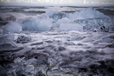 Glacial Ice on the beach at Jokulsarlon, Icelandの写真素材