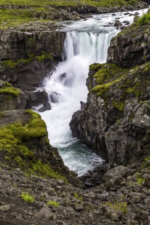 One of the many waterfalls in south Icelandの写真素材