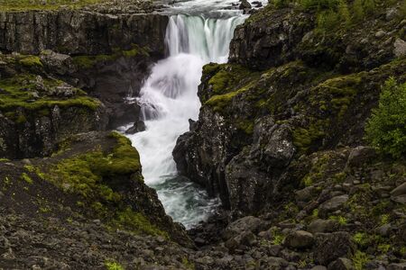 One of the many waterfalls in south Icelandの写真素材