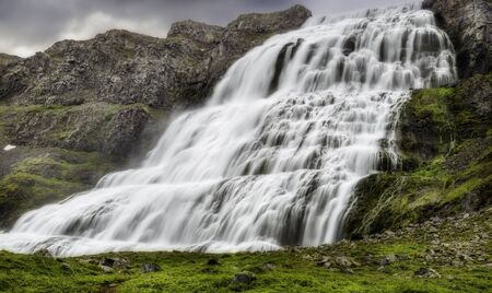 A beautiful waterfall in the Westfjords of Icelandの写真素材