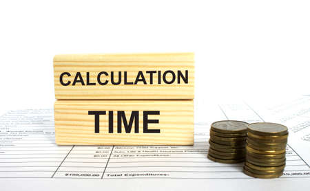 Wooden block with text Calculation Time. Finance conzept