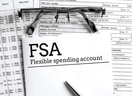 Papers with flexible spending account FSA on a table, business concept.の写真素材