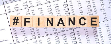 Word FINANCE made with wood building blocksの写真素材