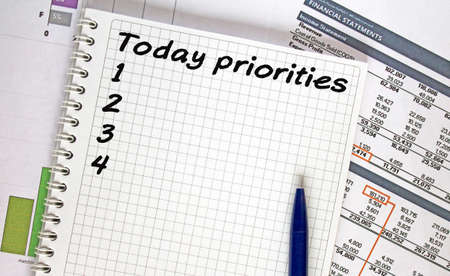 Text Today Priorities. Financial planning on notebook, business and finance concept.の写真素材