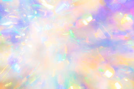 Abstract peaceful zen magical fairy tale background texture of gentle delicate candy colored glow and sparkling iridescent pastel bokeh light reflectionsの写真素材