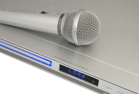 Metal dynamic microphone on the player cdの写真素材