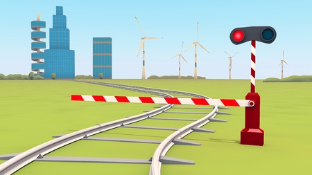 barrier closes the railway, buildings and wind-turbinesの写真素材