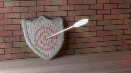 Arrow hit the shiald target on the brickwallの写真素材