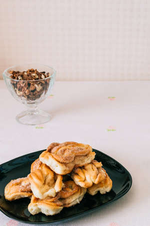 Cinnamon rolls are on a black plate. Easy and Basic dessert menu. Niceの写真素材